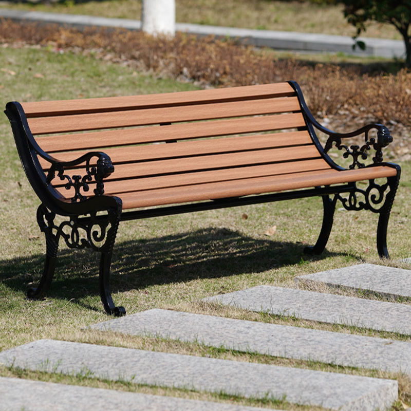 Simple Outdoor Bench in Sepia with Back, Metal Frame, and Curved Arm