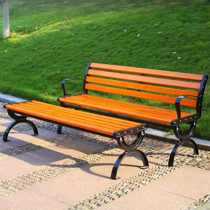 Simple Outdoor Bench with Tan Engineered Wood, Back, and Curved Arm