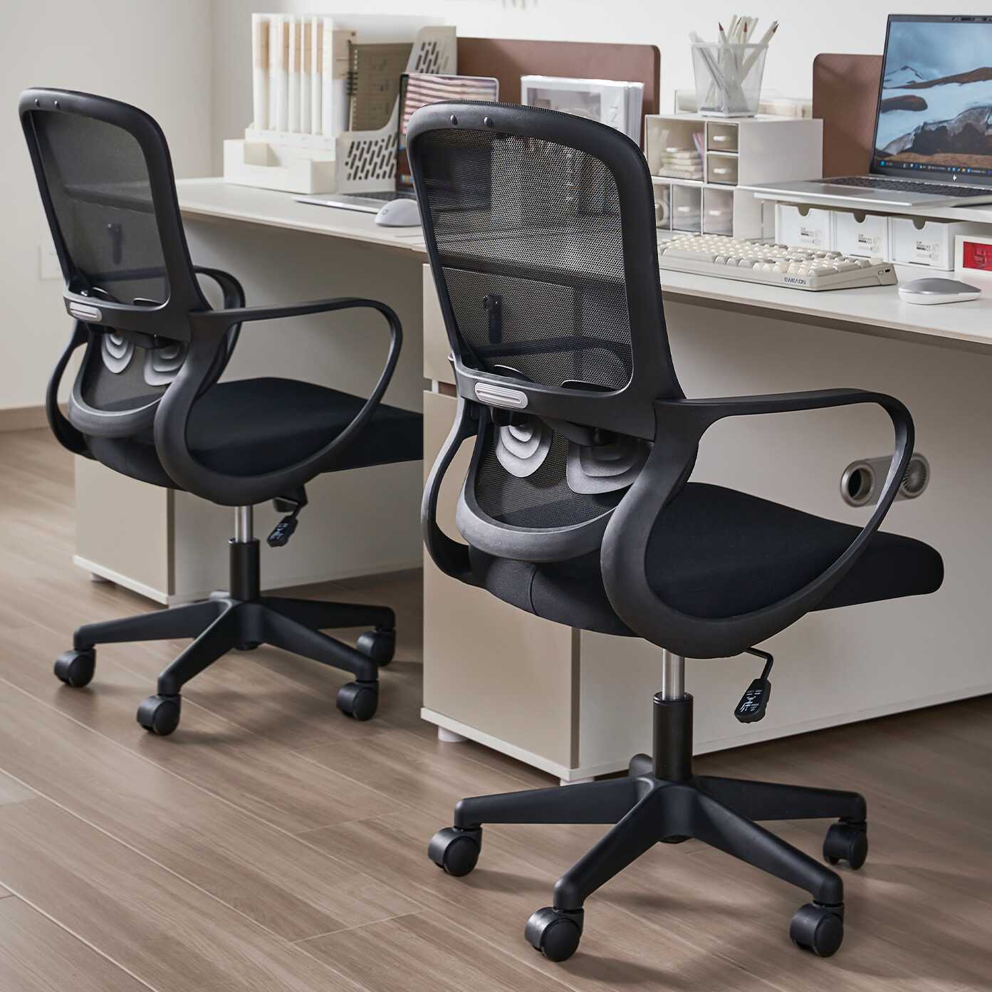 Upholstered Ink/Dove Grey Studio Chairs with Rollers, Fixed Arms, Lumbar Support, Tilt Available, and Headrest