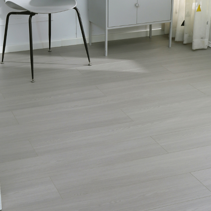 Elegant Waterproof Laminate Wood Planks - Smooth High-Quality Flooring Designed for Living Spaces